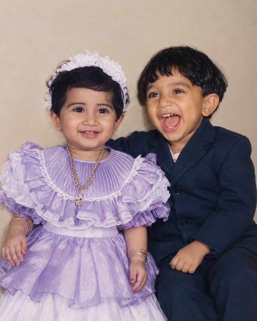 Hiba and Savan as little children, laughing together